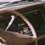 old fashioned car interior with steering wheel